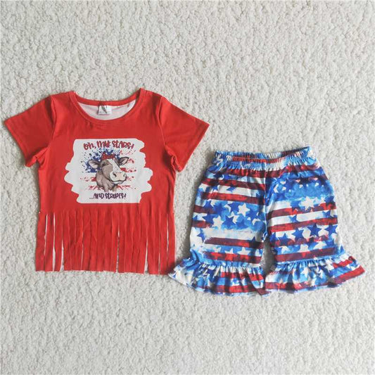 girl fashion tassel red top and blue shorts outfit with cow print