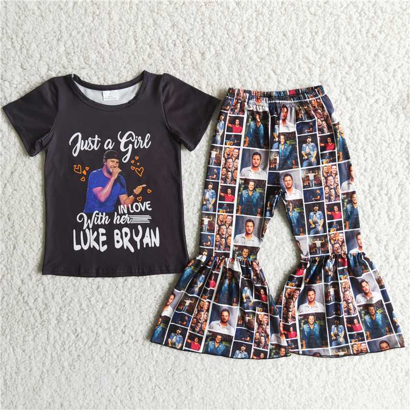 girl black short sleeve top and bell pants outfit