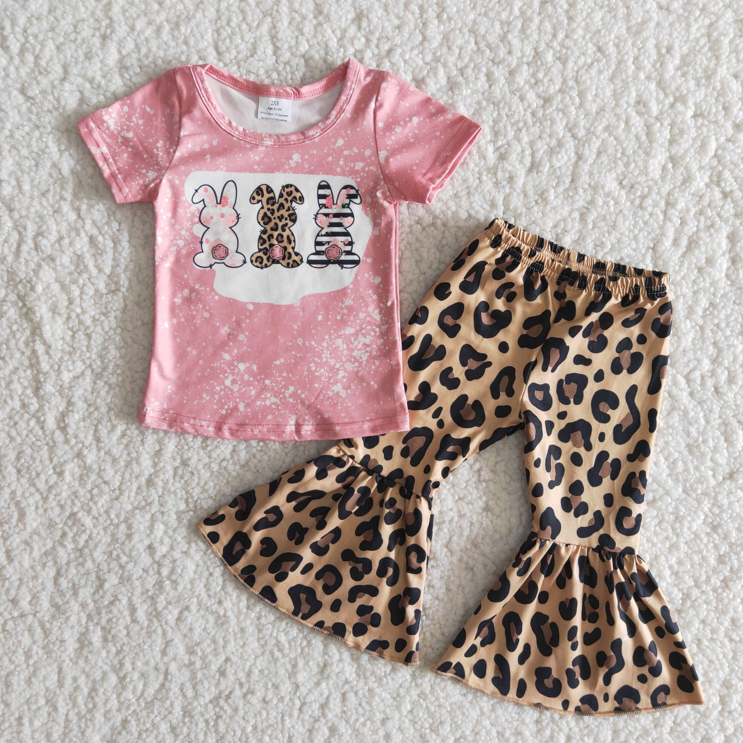 girl pink short sleeve top match leopard bell pants