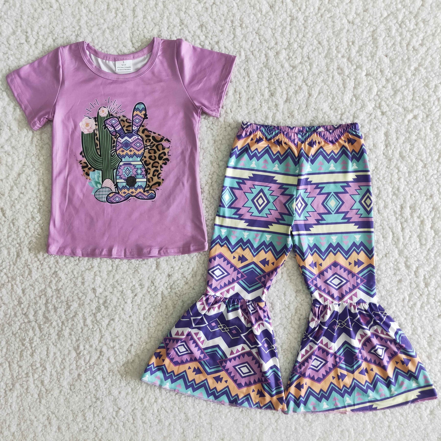 girl purprl short sleeve outfit with cactus and bunny pattern
