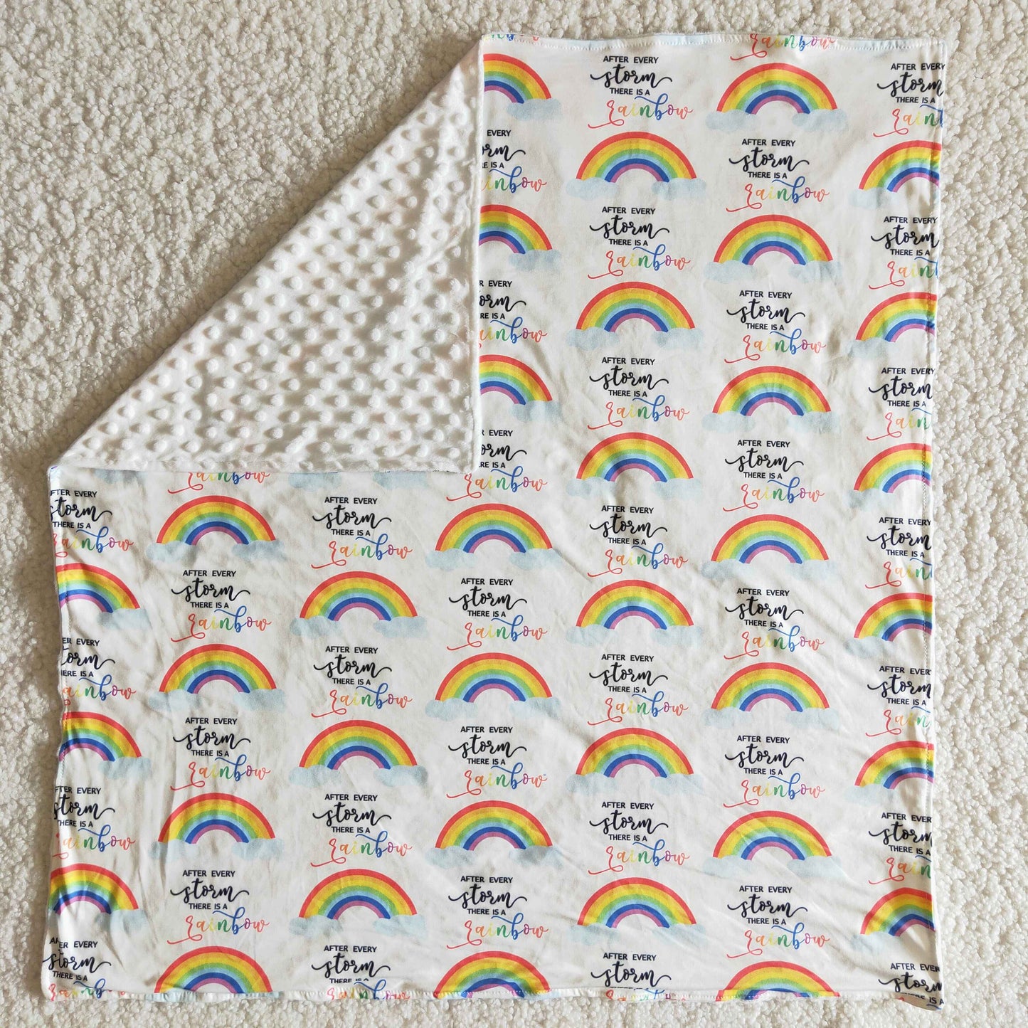 infant white soft blanke with rainbow print