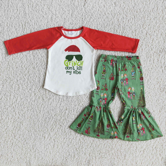 girl fashion sunglasses  print raglan shirt and green bell bottoms outfit