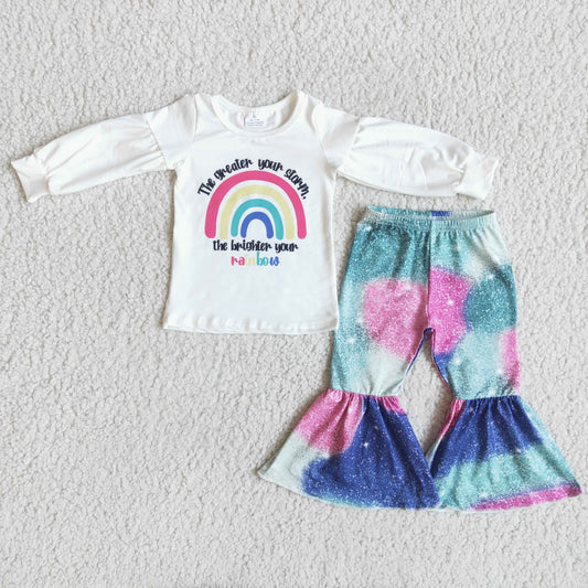 girl rainbow print top and tie-dye bell pants outfit