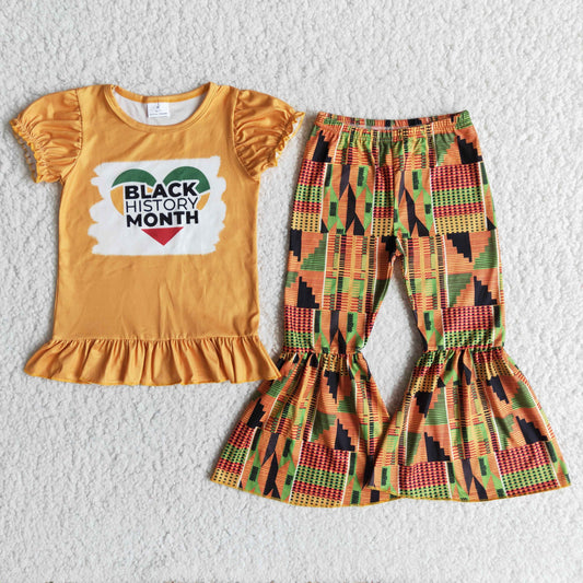 girl puff sleeve outfit with black history month letters