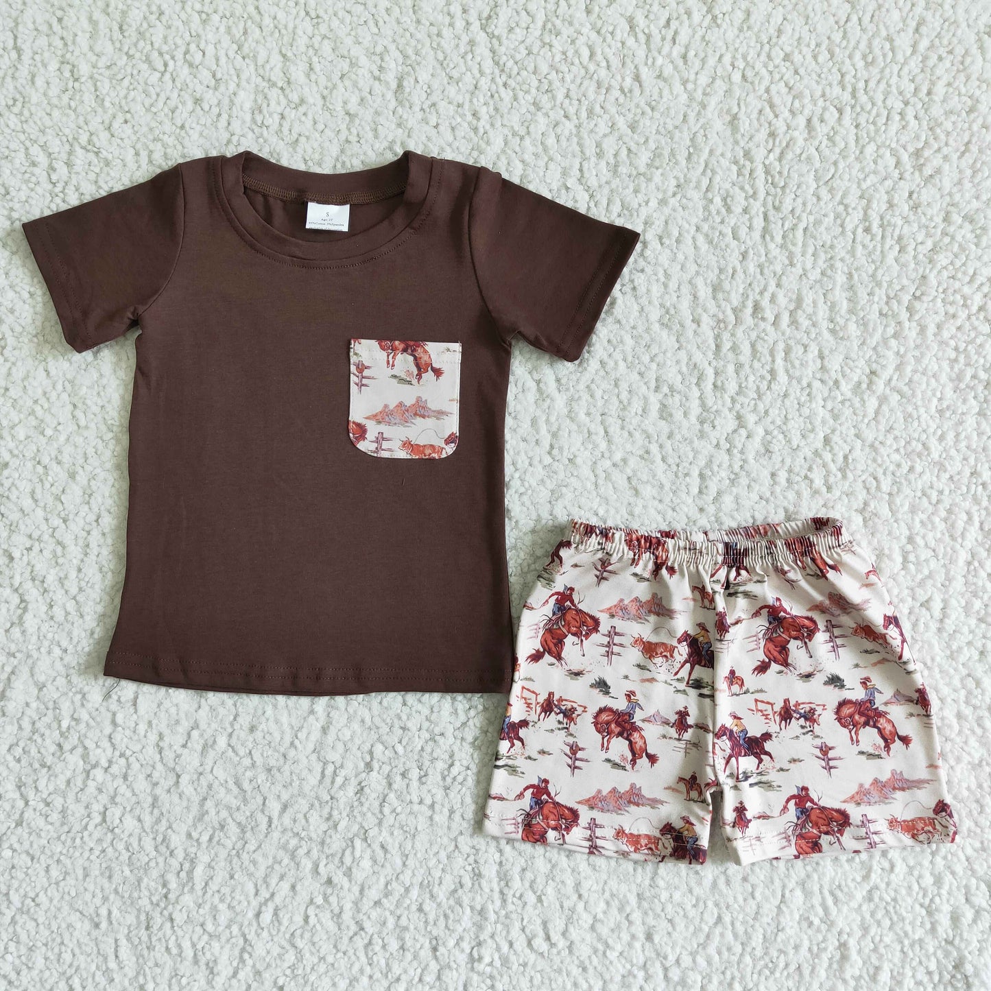 boy brown short sleeve shirt and horse print shorts outfit