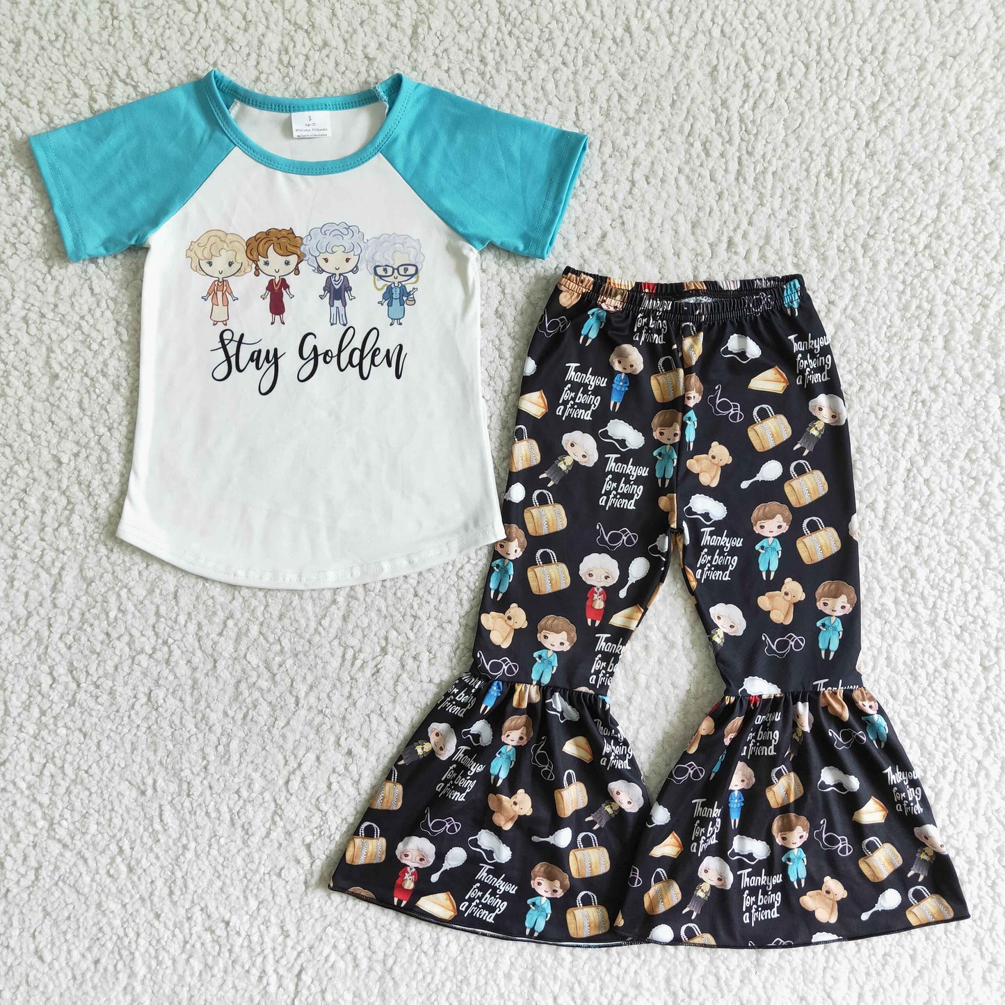 girl blue raglan shirt and black pants outfit