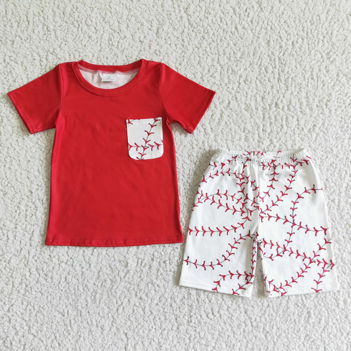 boy red cotton top with pocket and white shorts outfit