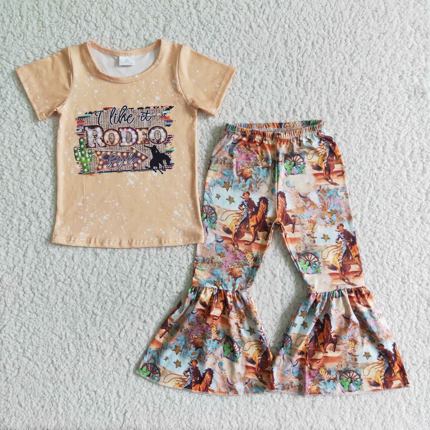 girl raglan shirt and flare pants outfit