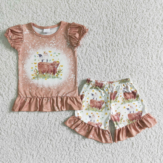 girl farm style puff sleeve top and ruffle shorts outfit