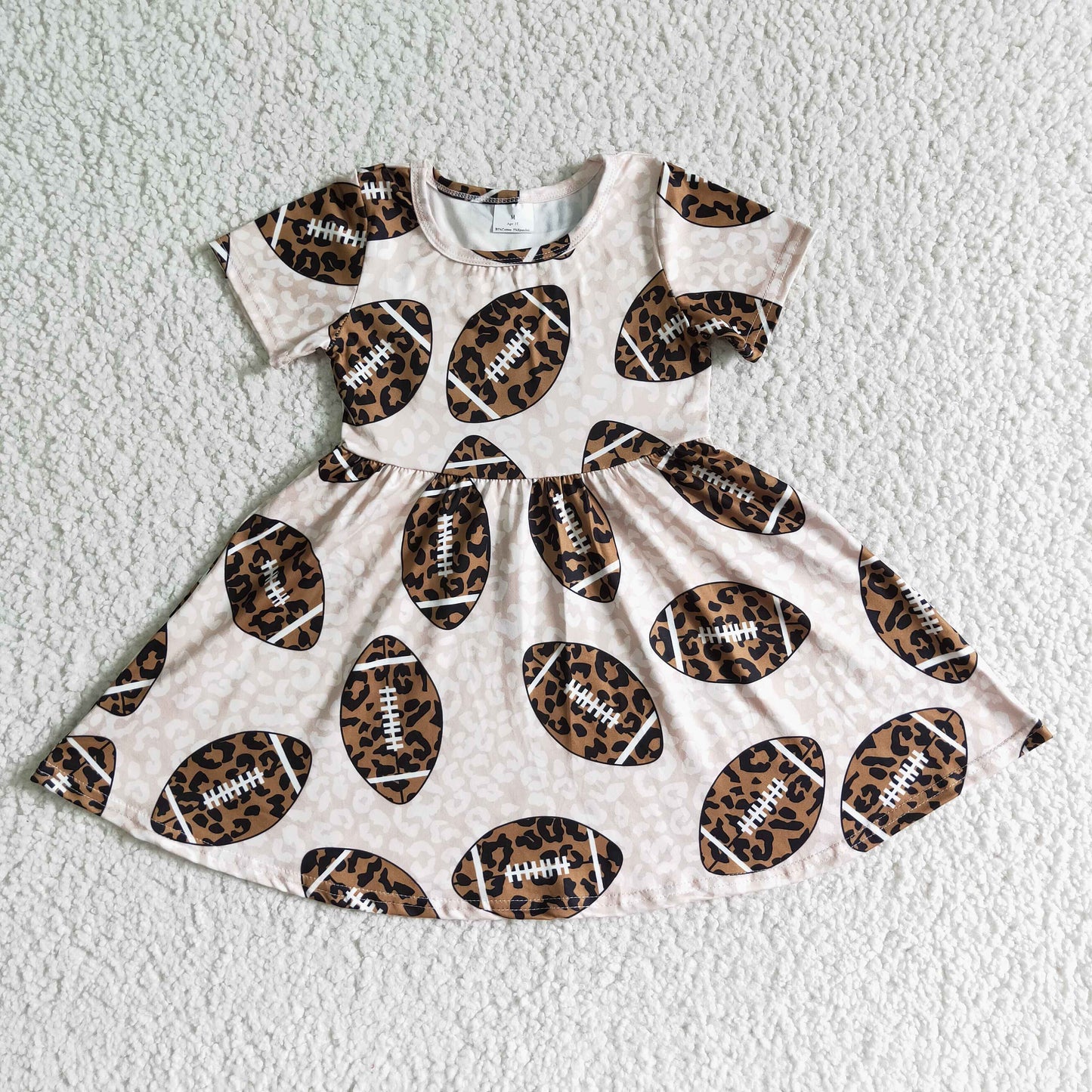 girl leopard football print twirl dress with short sleeve