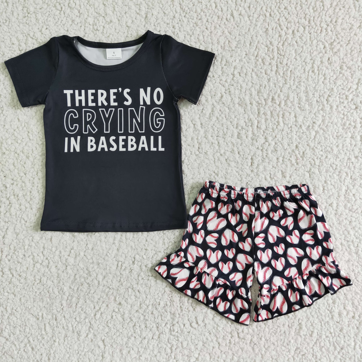 girl black short sleeve top and baseball shorts set