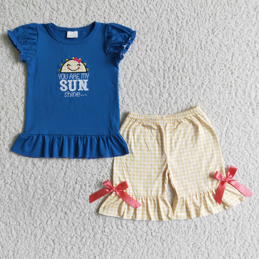 girl blue cotton embroidery top and plaid shorts outfit with red bow-knot