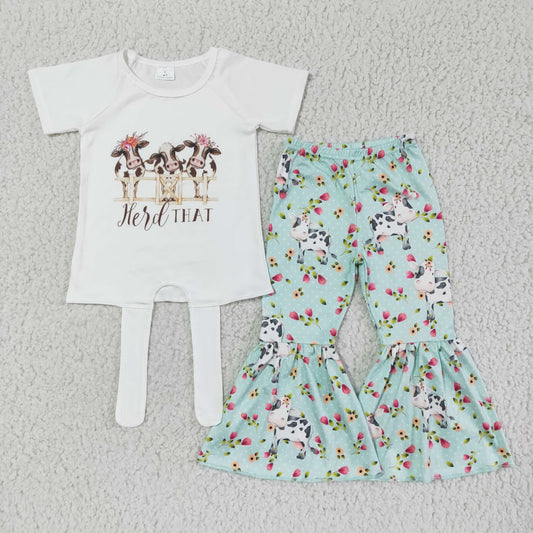 girl white short sleeve top with milk cow match floral bell pants